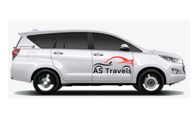 White AS Travels passenger van in side profile with tinted windows