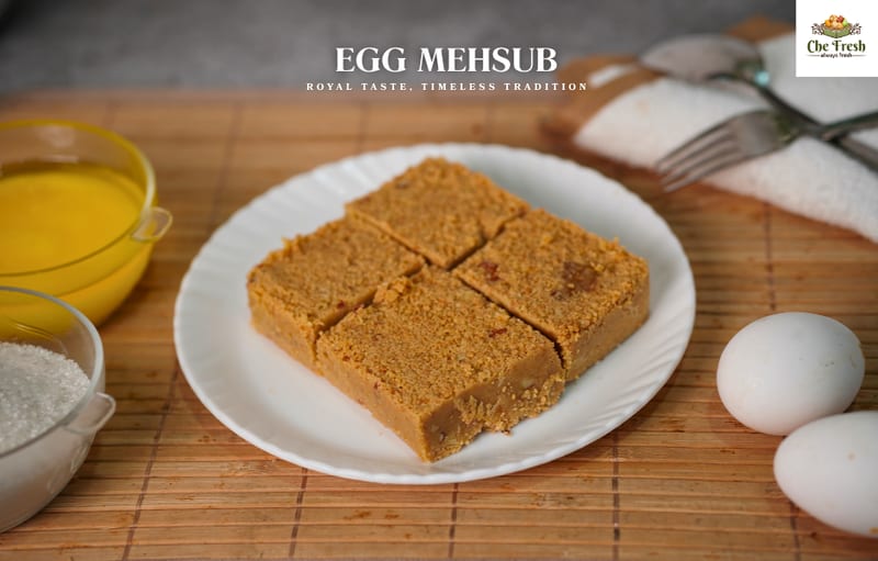 Sliced egg mehsoub with whole eggs and bowls
