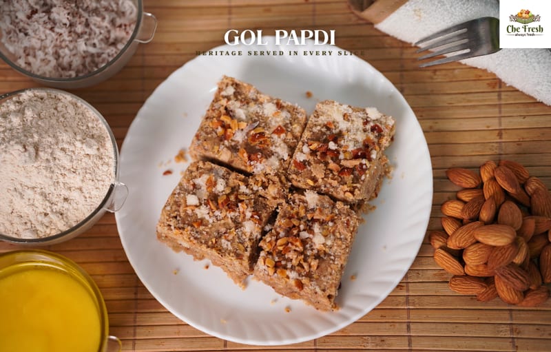Golden square sweets with almonds and cooking ingredients