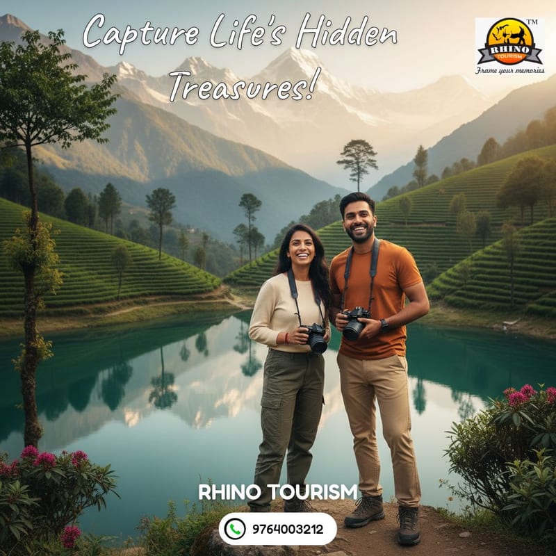 Two travelers with cameras beside a terraced mountain lake in a Rhino Tourism promo