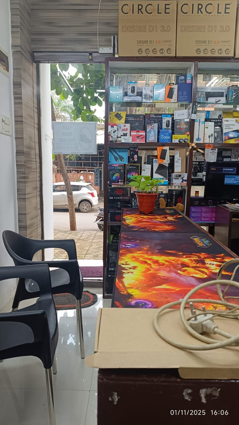 Shop interior with product shelves, seating, counter and glass entrance