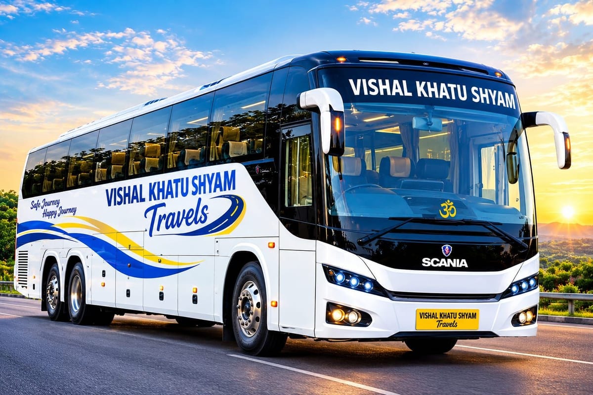 White Scania coach marked Vishal Khatu Shyam Travels on a road at sunset