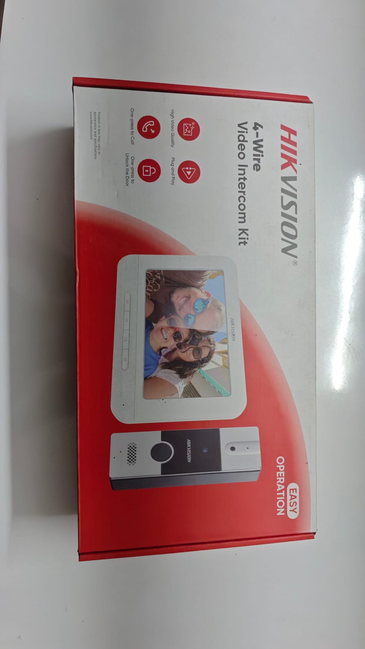 Hikvision 4-wire video intercom kit box showing monitor and door station